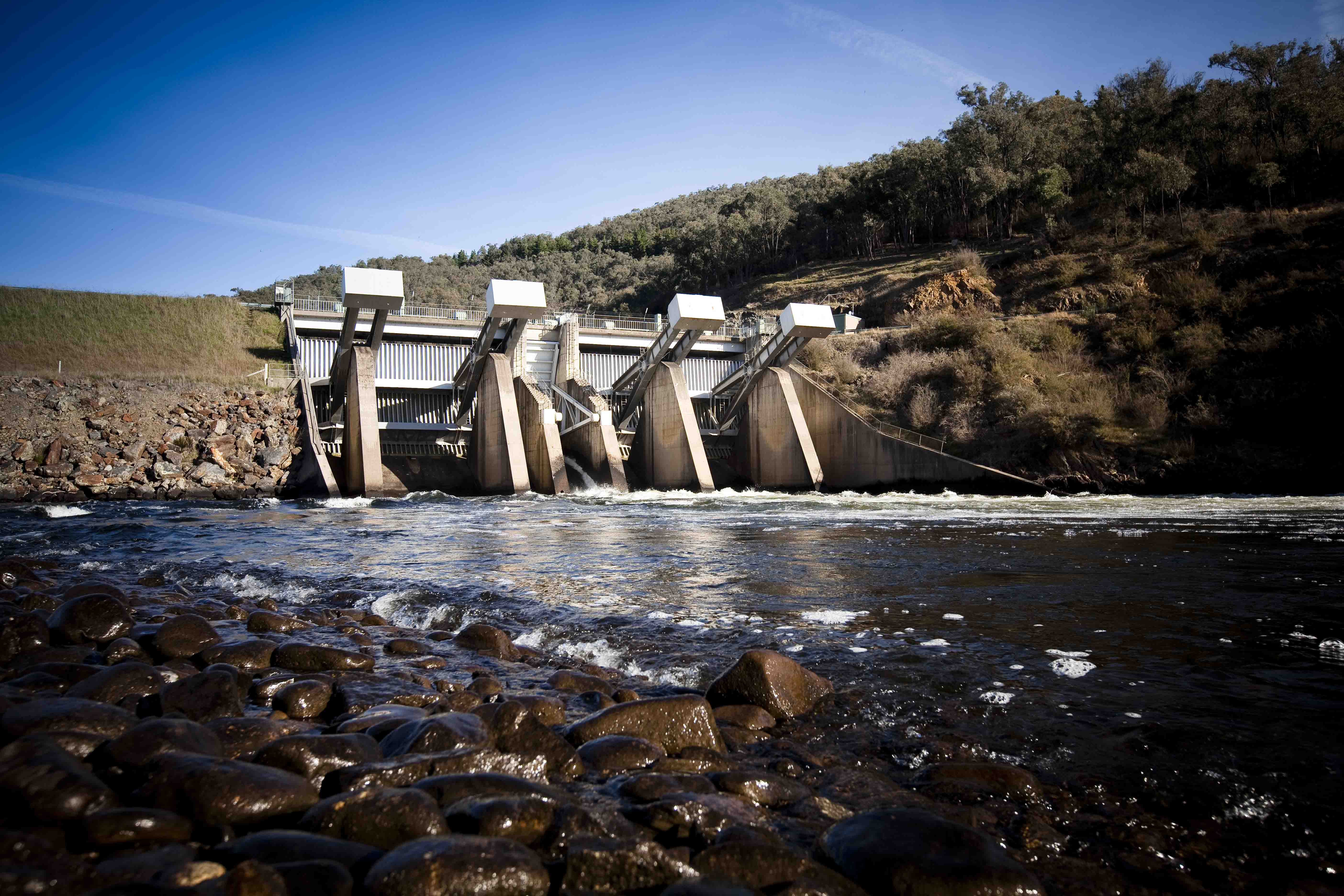 Khancoban_release-gates_water_rocks_trees_sky6;